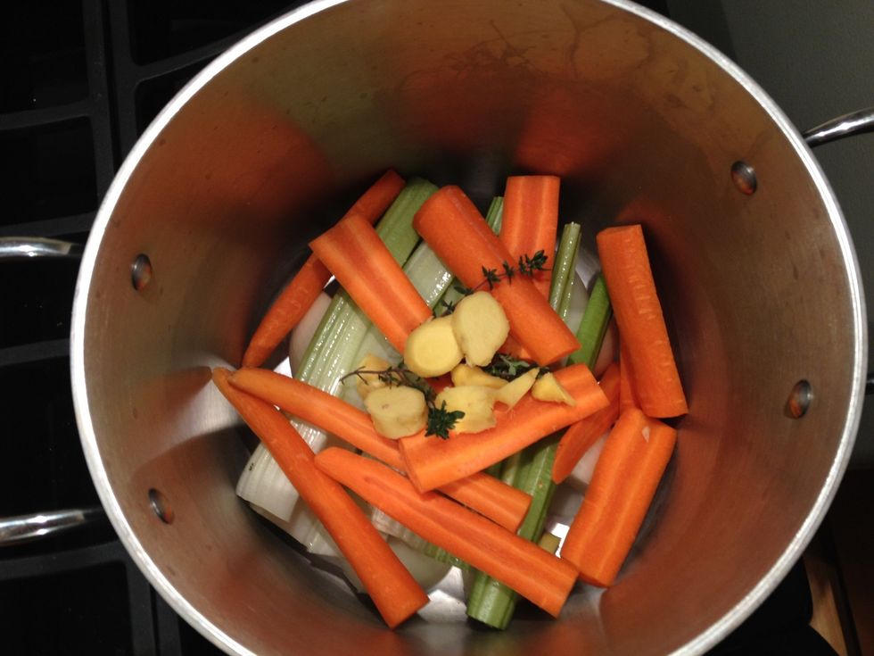 Add eight pieces of quarter sized slices of ginger.