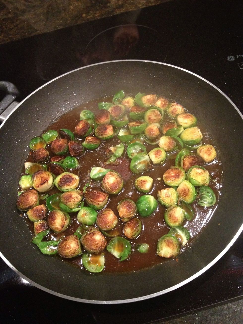 Add enough broth to cover the bottom of the pan. (I had left some of my sprouts face down too long hence why the upper left corner ones are a little blacker)
