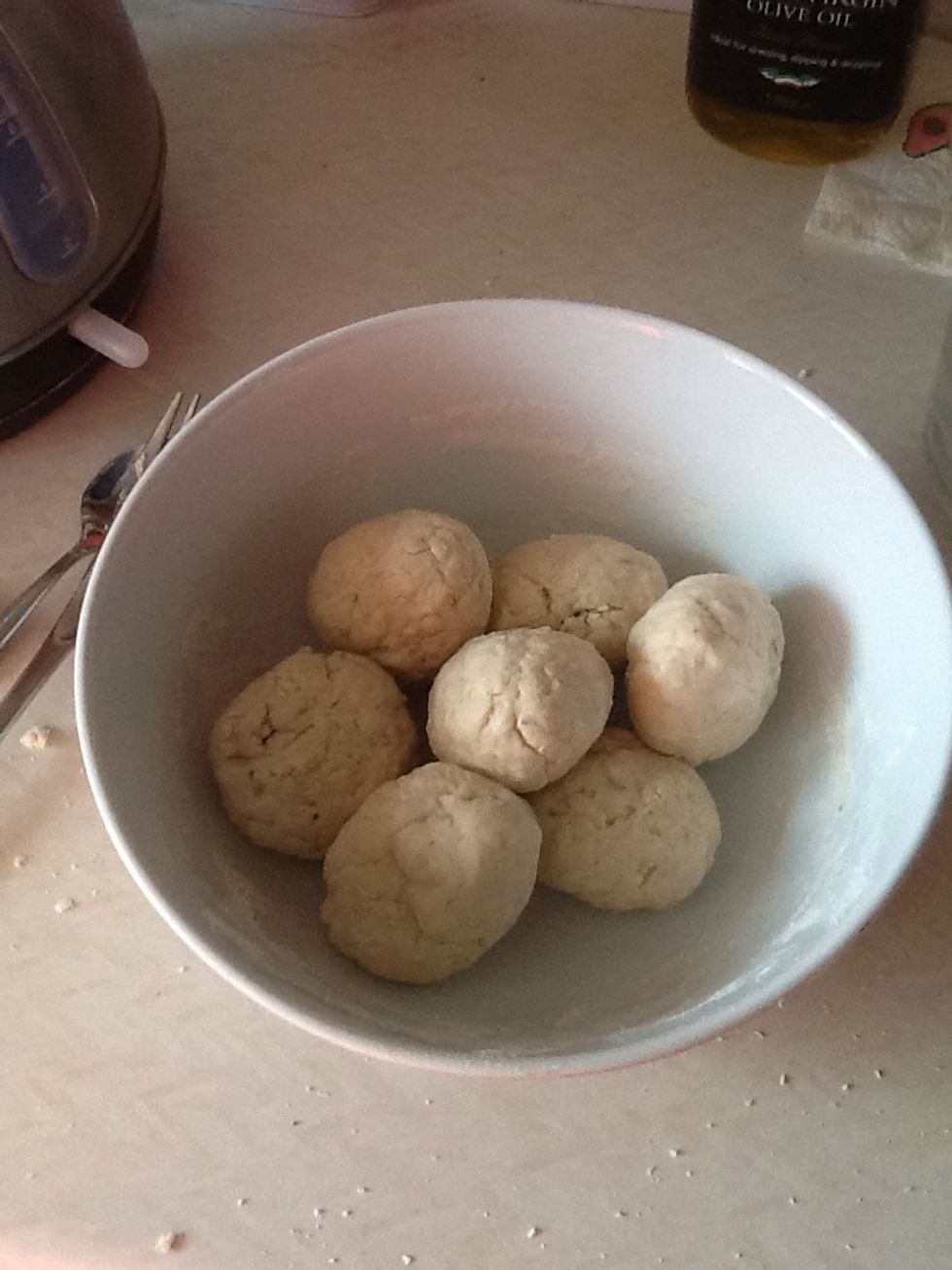 Add enough cold water to the mixture to make dough balls