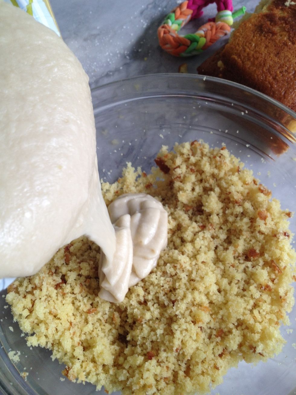 Add enough frosting to the cake crumbs so it as a dough like texture, if u feel u need a bit more, then add more and mix GOOD