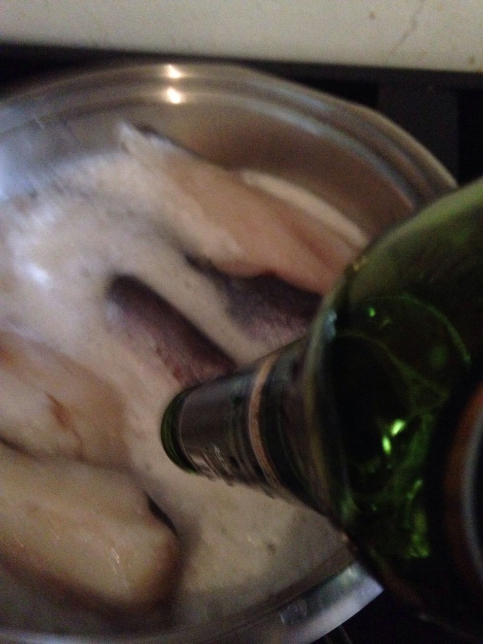 Add enough water to cover the fish, season and put on a medium heat to poach gently. It will simmer and froth. Turn off the heat after 15 min and leave it there to marinate.