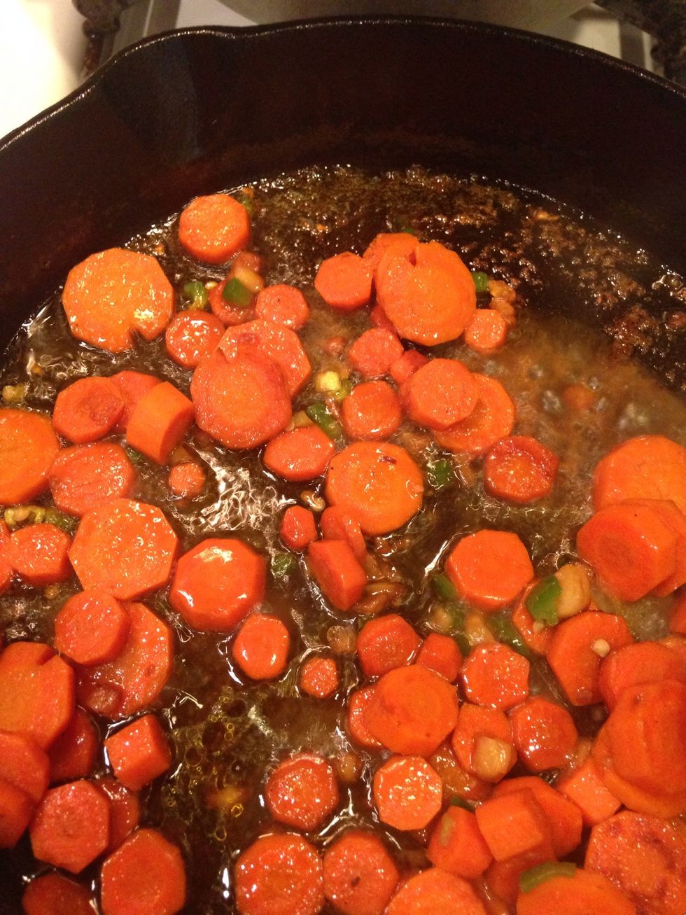 Add enough water to the pan to just coat the bottom so you don't burn the carrots & to scrape up any flavors that may have gotten stuck. Again, mind your business about those jalape\u00f1os!