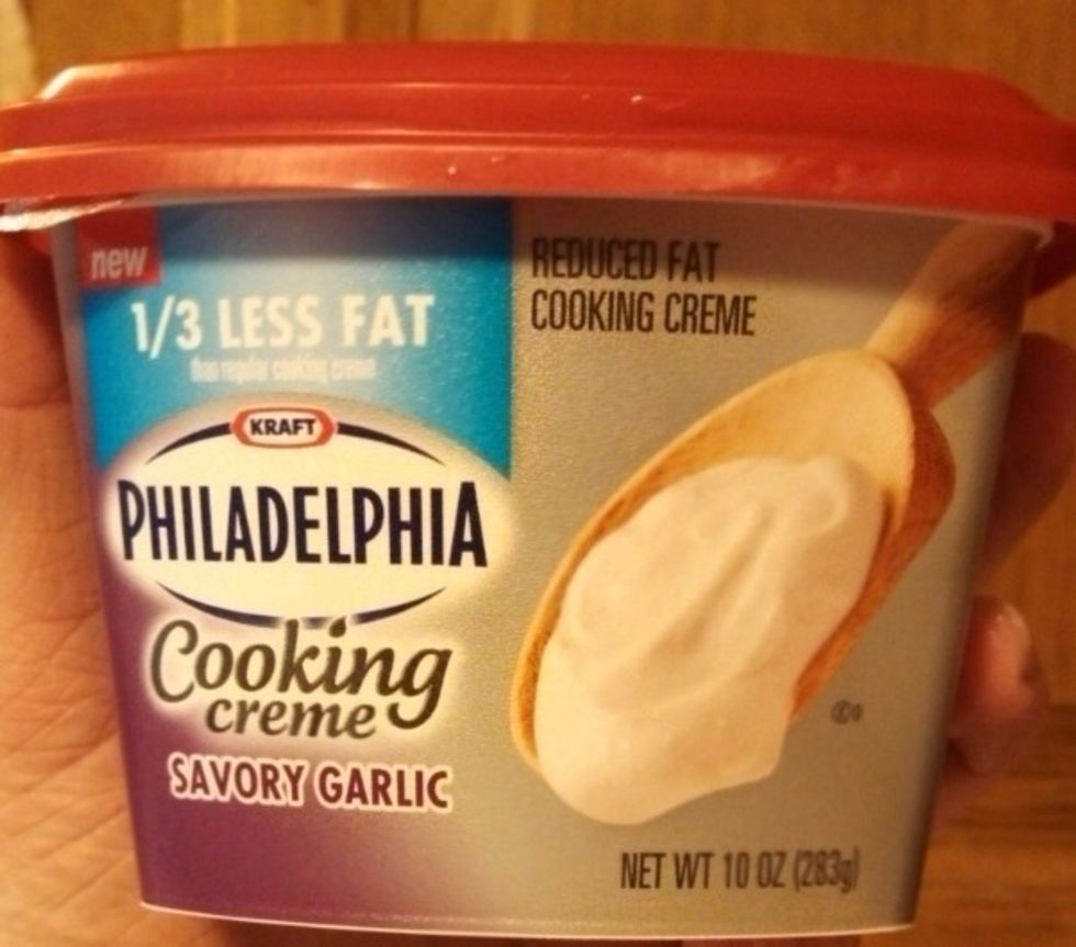 add entire container of cooking creme to chicken - do not do this before doing next step