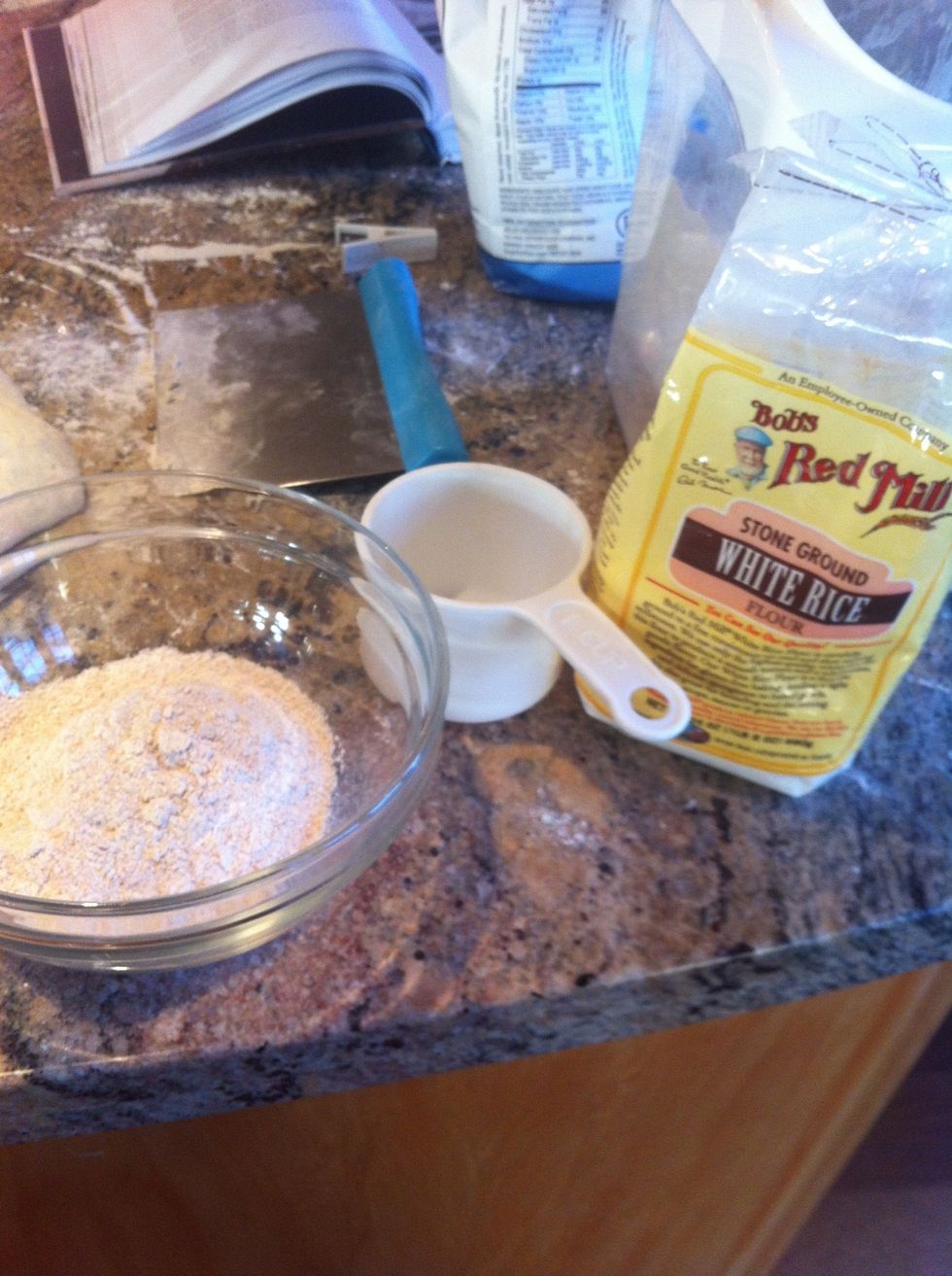 Add equal amounts of wheat flour and rice flour in a bowl.