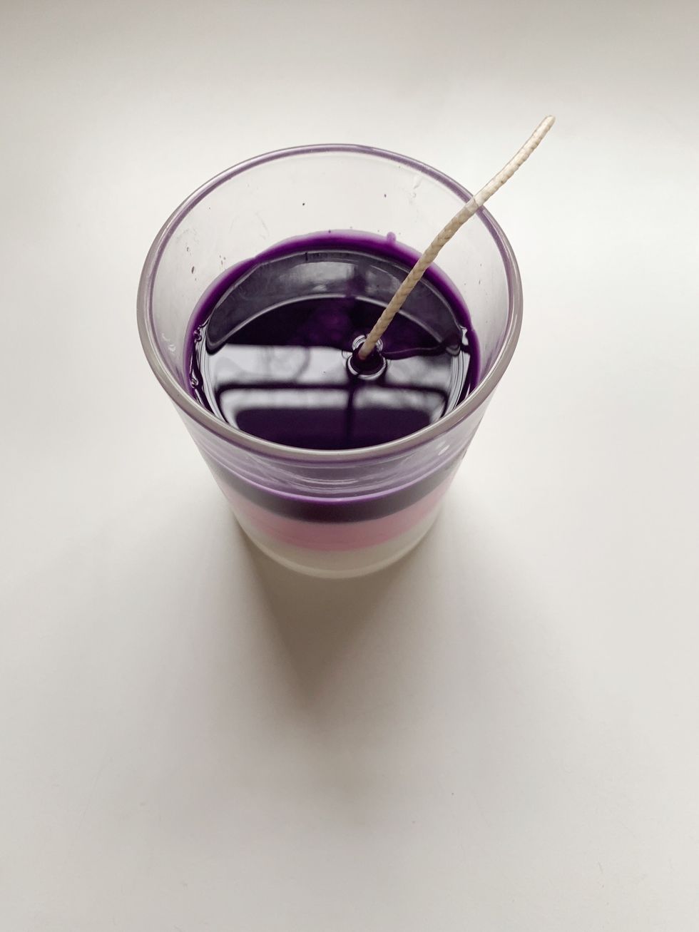 Add essential oil, and let the third layer sit for 10 minutes to dry.