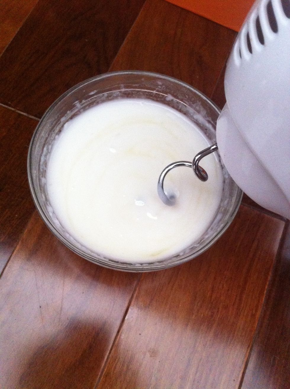 Add essential oil and phenonip when the mixture is set and cool down to lower than 60 degree C. I used neroli and rosewood essential oil blend here.