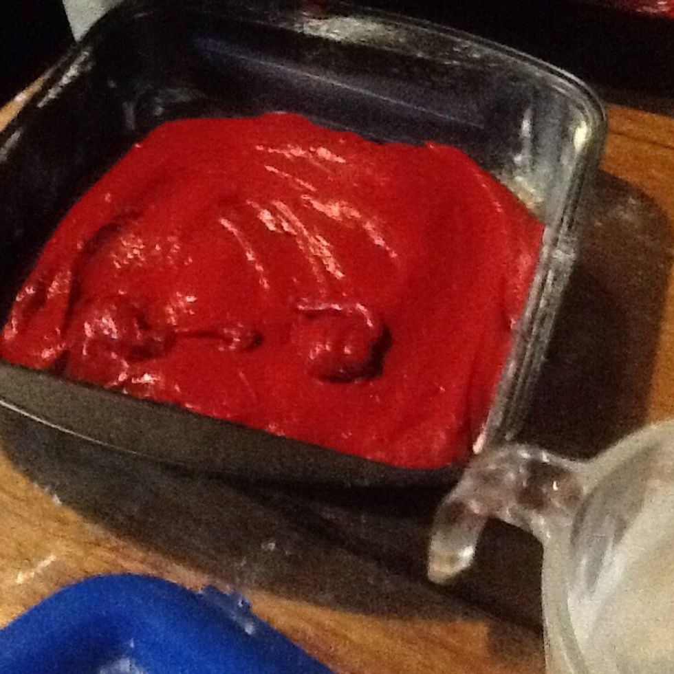 Add evenly to both tins