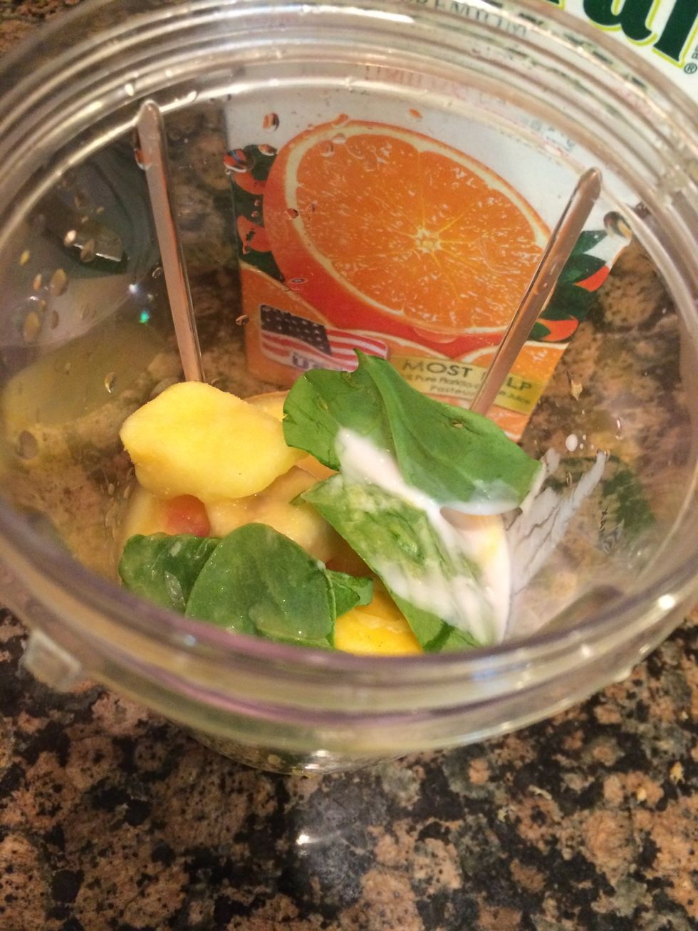 Add everything to blender. I didn't measure, just eyeball it. Yes, I know it's a teeny amount of spinach, but I'm easing into it!