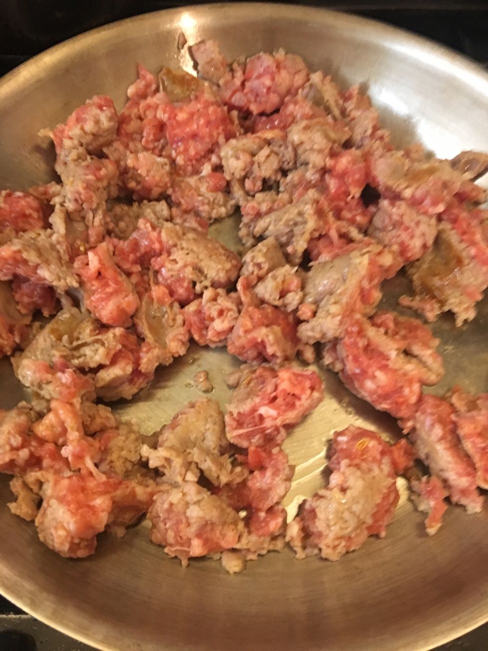 Add EVOO to medium heat pan. Cut up the sausage and brown.  This uses Italian sausage, but you can lighten the recipe by using chicken sausage or ground turkey.