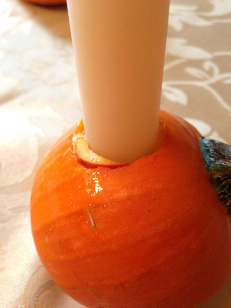 Add extra pumpkin wedge in order to secure candles. (If necessary)