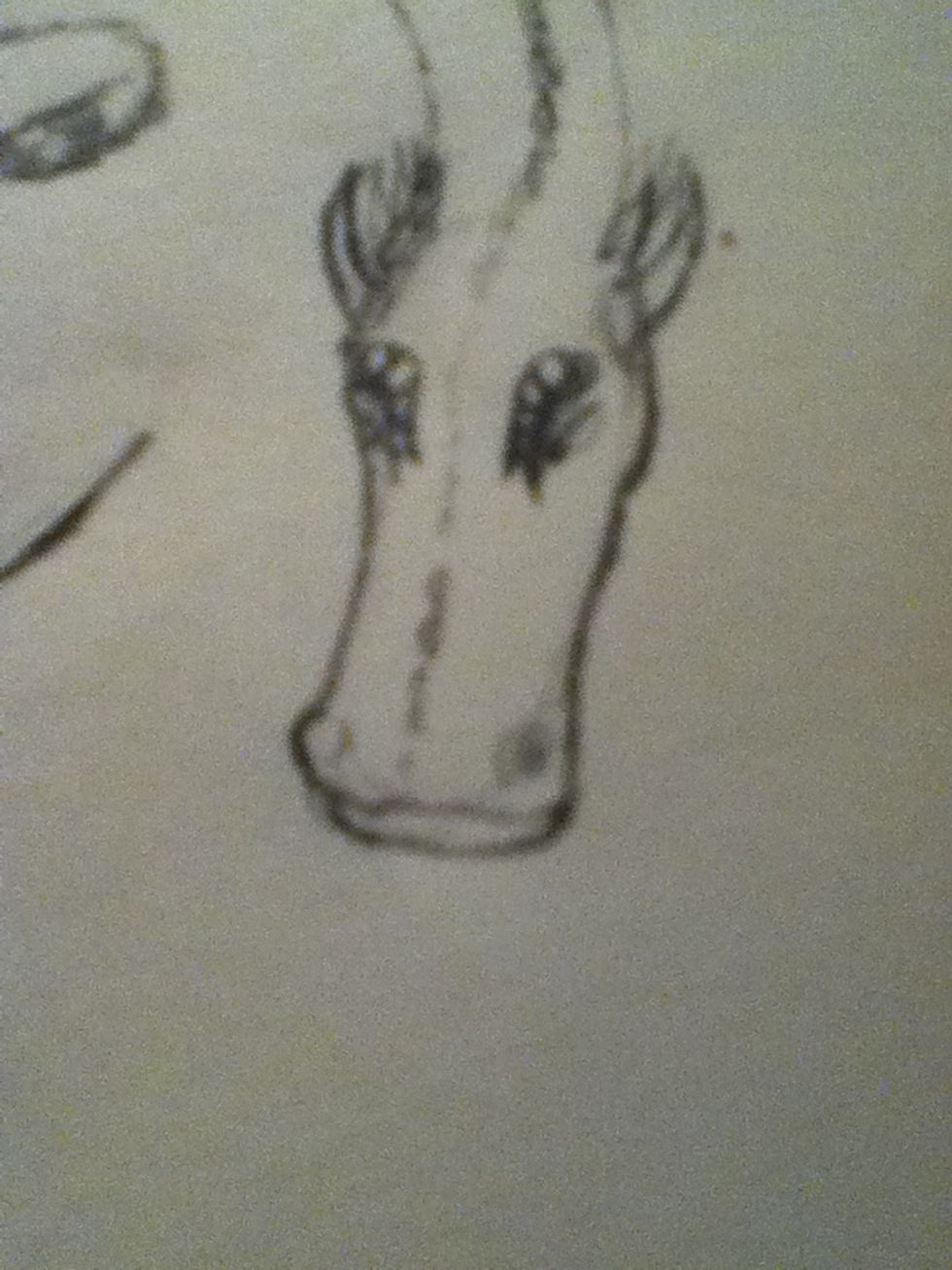 Add eyes, brow scales and other details. The brows on mine are too big, also the eyes are closed if you cant see. My camera isn't very good. \ud83d\ude16