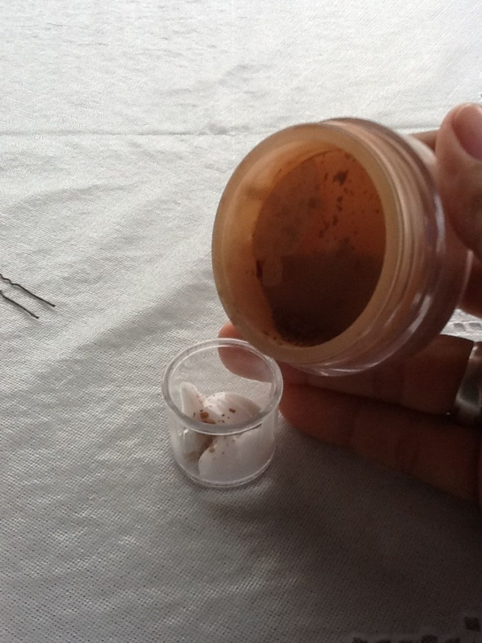 Add face powder. I used NYC loose face powder.