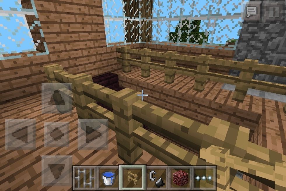 Add fence banisters around the staircases.