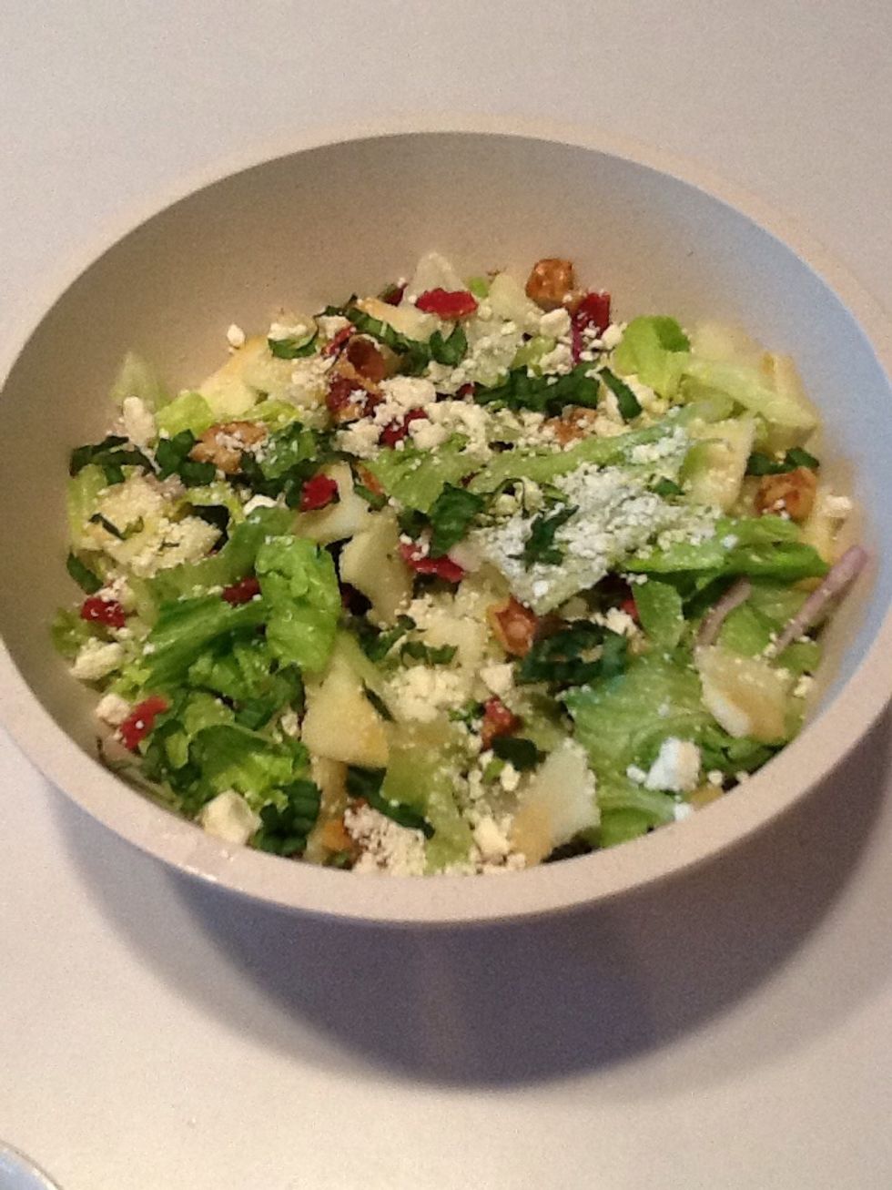 Add feta and basil to salad.
