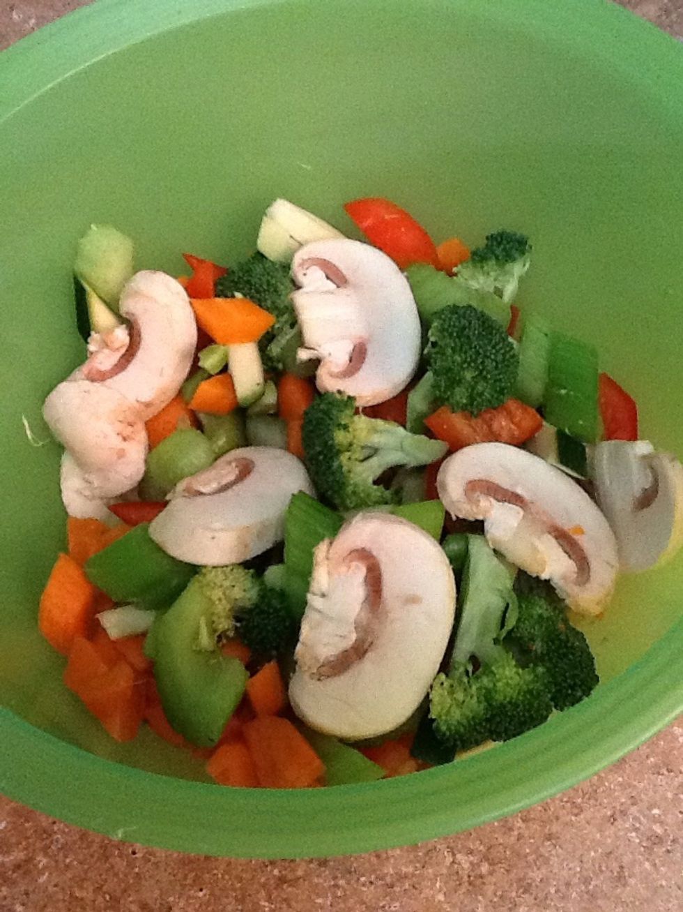Add finely sliced vegetables to beef in wok. They look great ;)