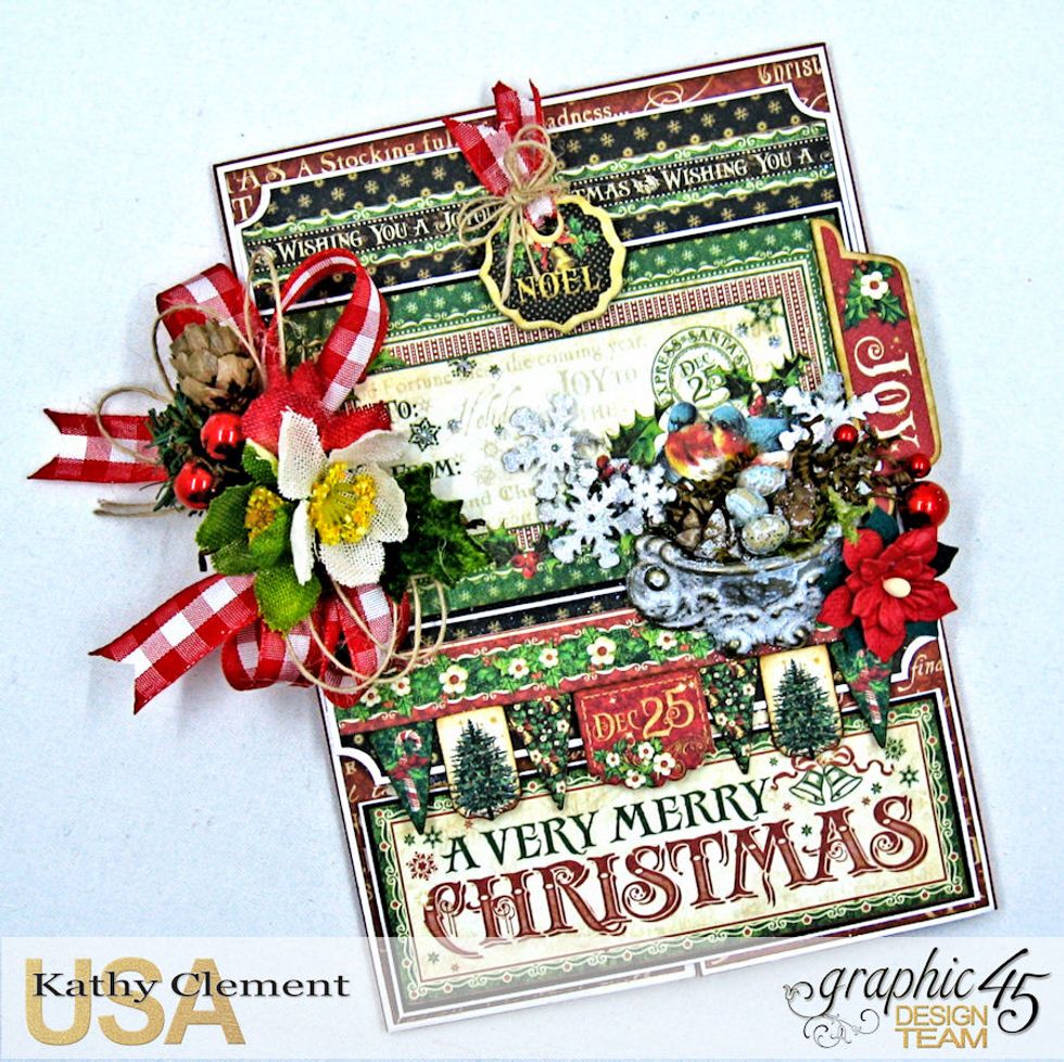 Add finishing touches to card: more berries in door pull and a mini Petaloo Paper Poinsettia at the base. The card is now finished!