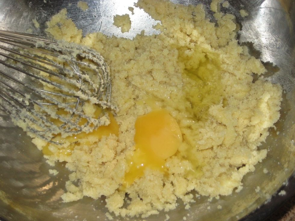 Add first egg and stir