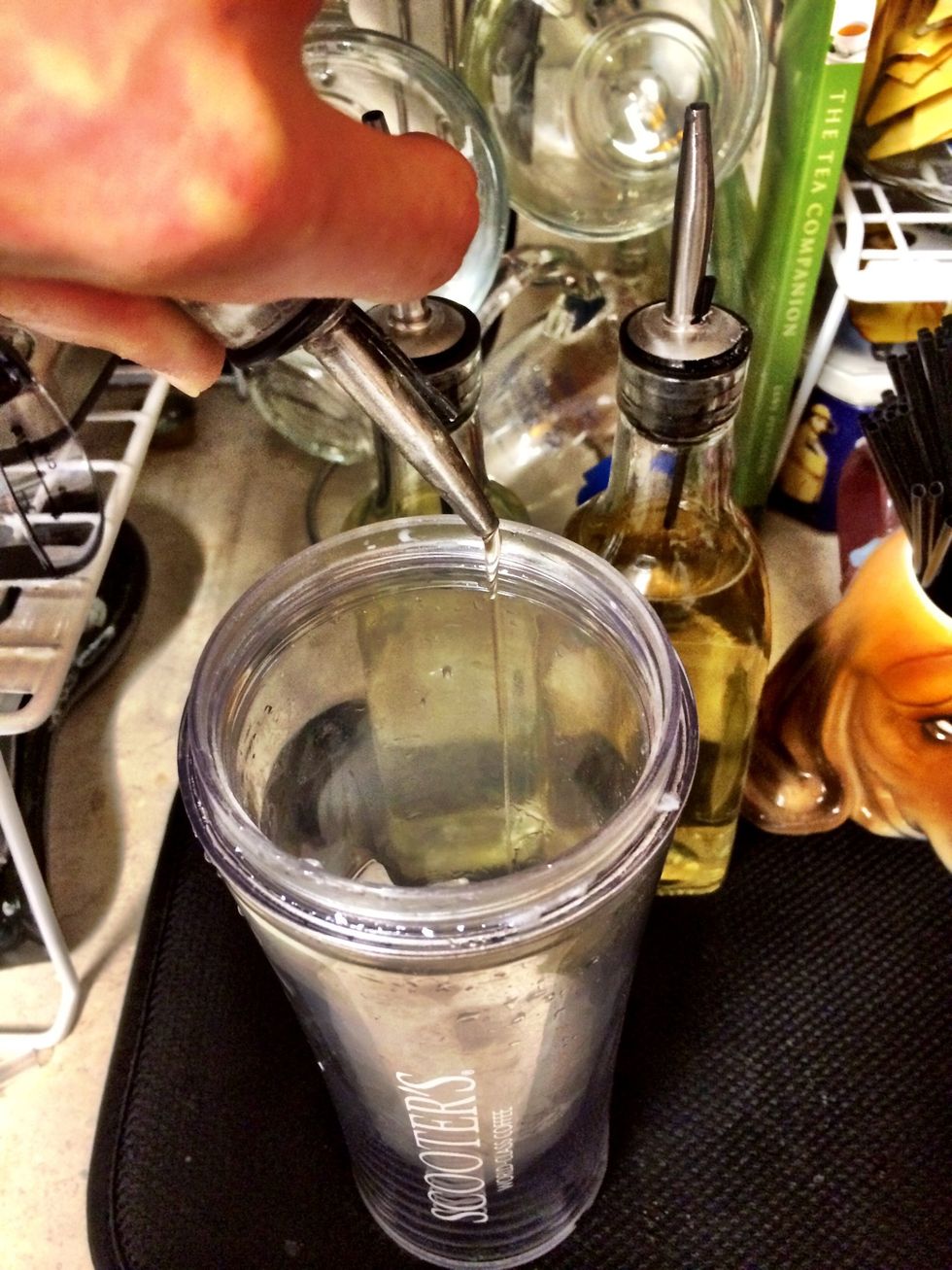 Add flavored syrup over ice