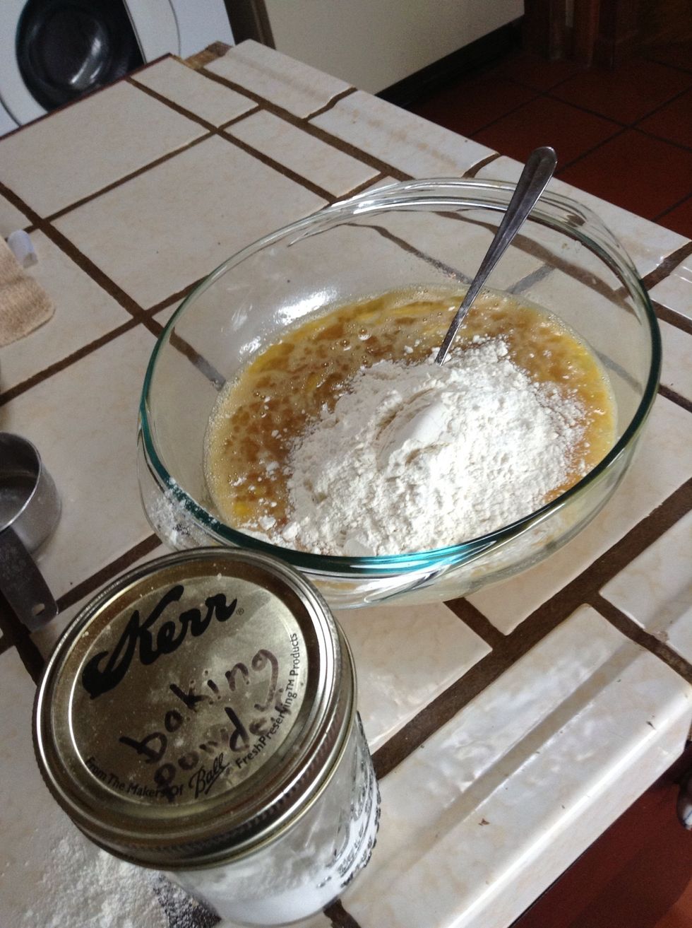 Add flour and baking powder. Mix.