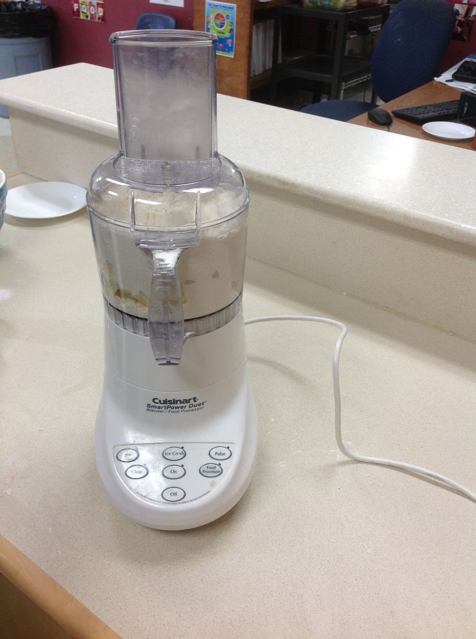 Add flour and butter into food processor, butter first and then flour