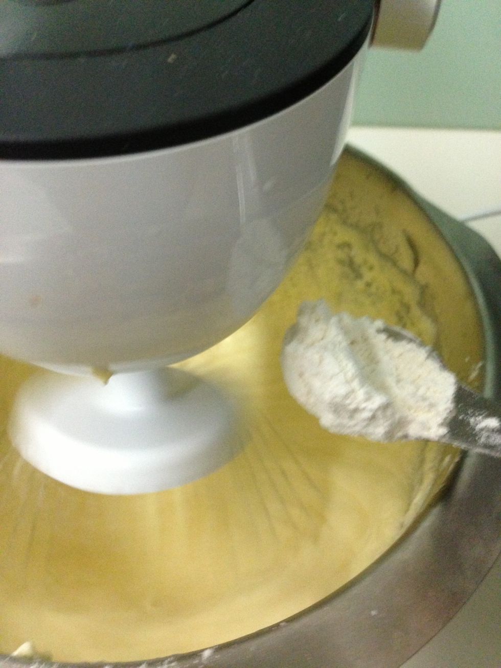 Add flour, baking powder and salt slowly and lemon juice. Beat until no traces of flour found in batter