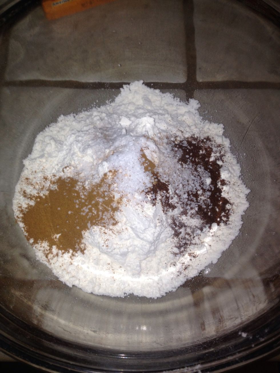 Add flour, baking soda, cinnamon, cloves and kosher salt to mixing bowl.