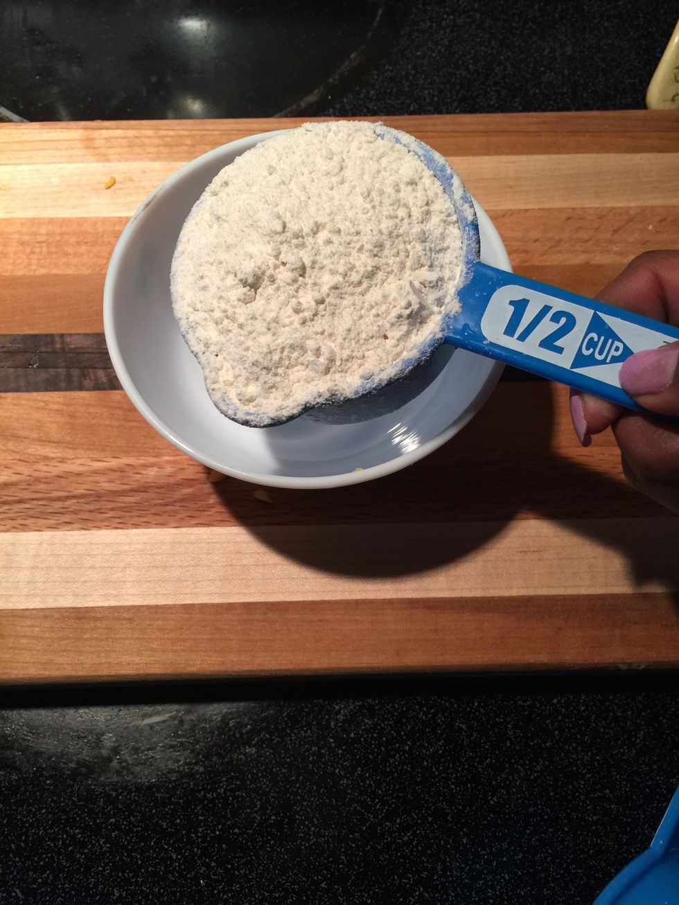 Add flour into a bowl