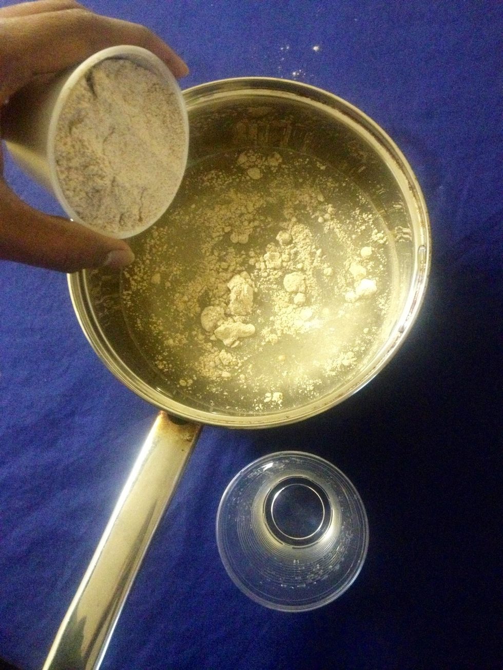 Add flour into the water and mix well