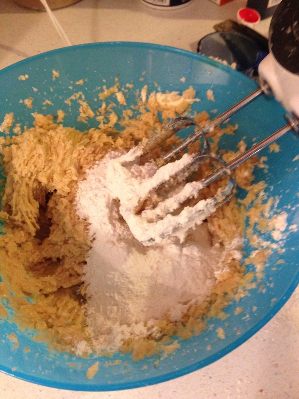 Add flour mixture a little at a time blending in between. Mixture will get thicker.