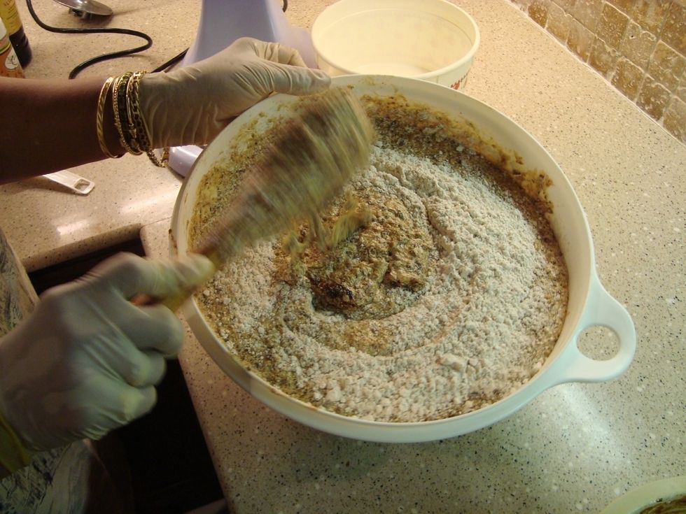 Add flour mixture with batter alternately mixing in rum and port wines.