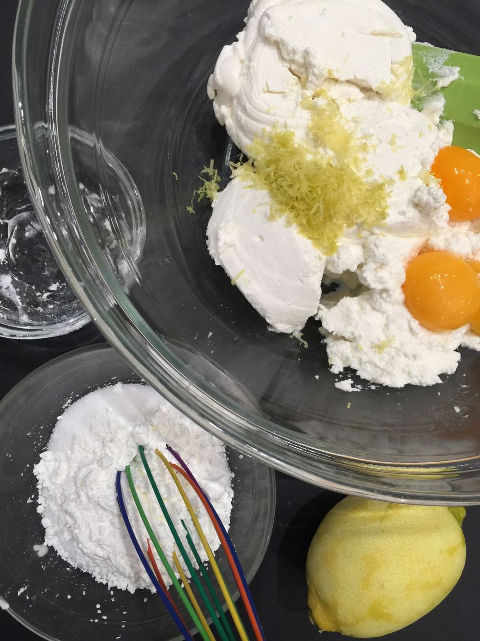 Add flour over sugar and mix.. Easier to mix with cheese without lumps