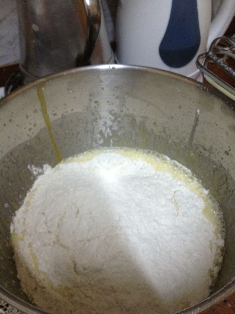 Add flour with baker's yeast an mix about 5 min