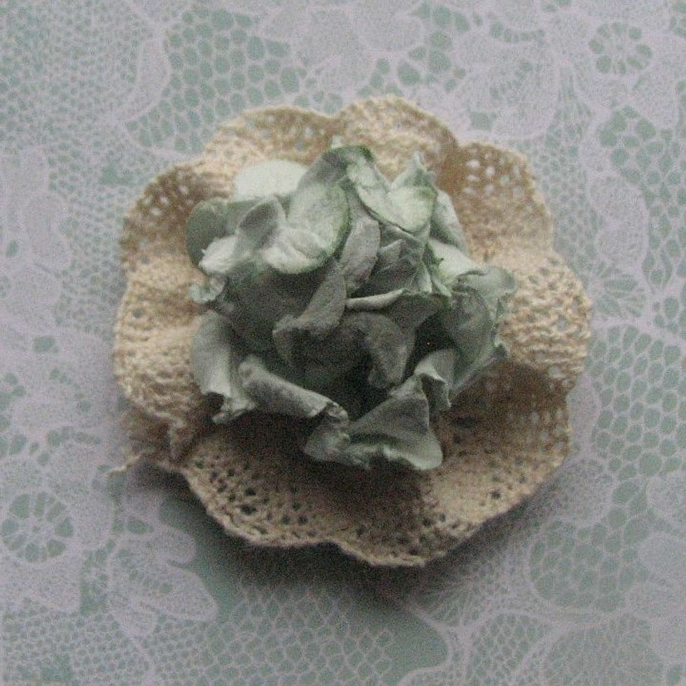 Add flower. Glue together with hot glue gun. Repeat process for more flowers.