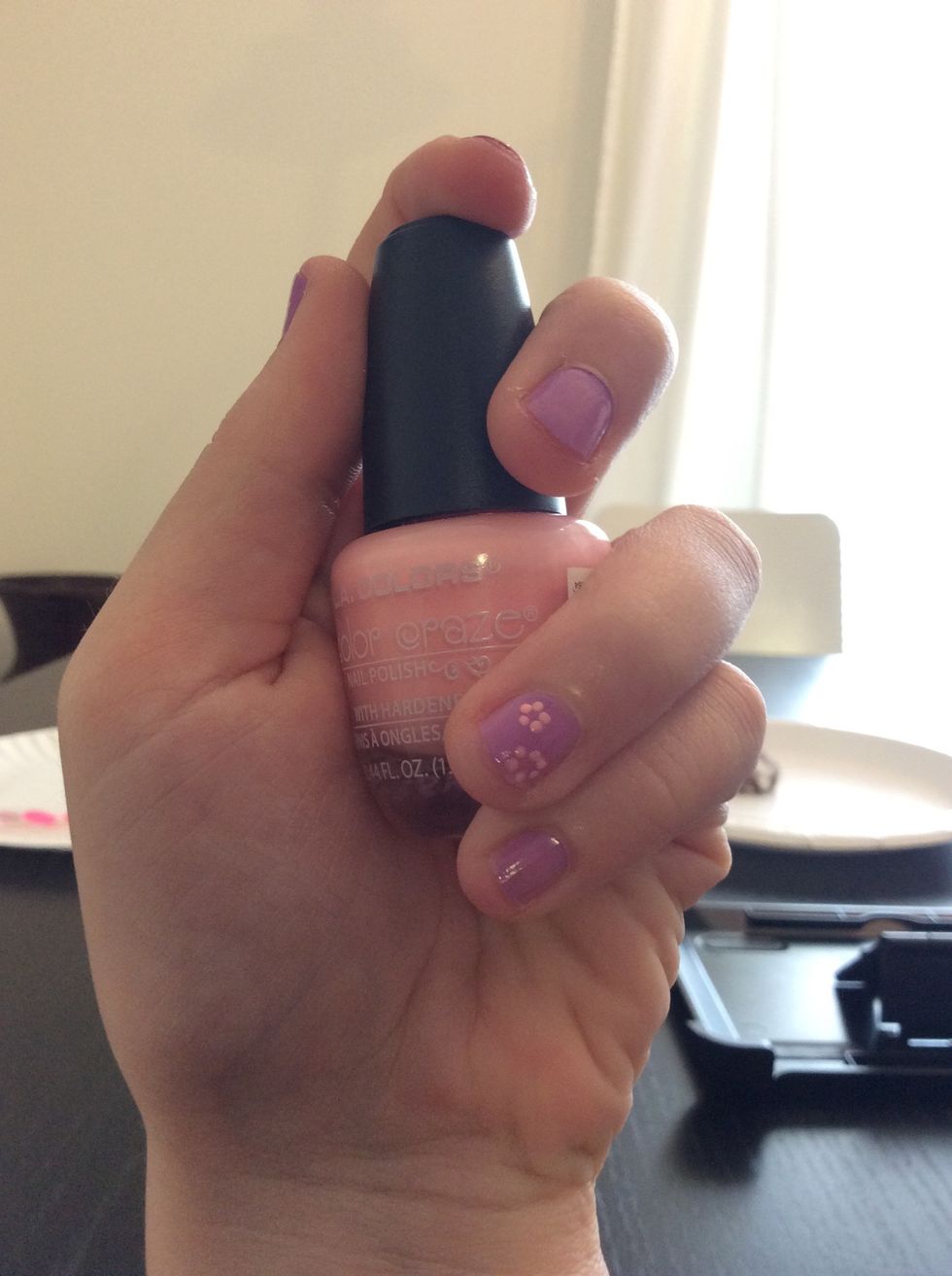 Add flower petals with dotting tool