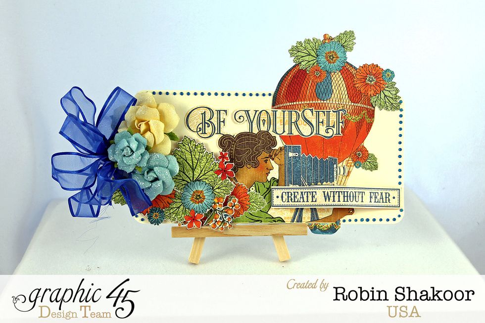 Add flowers and ribbon and your tag is complete.