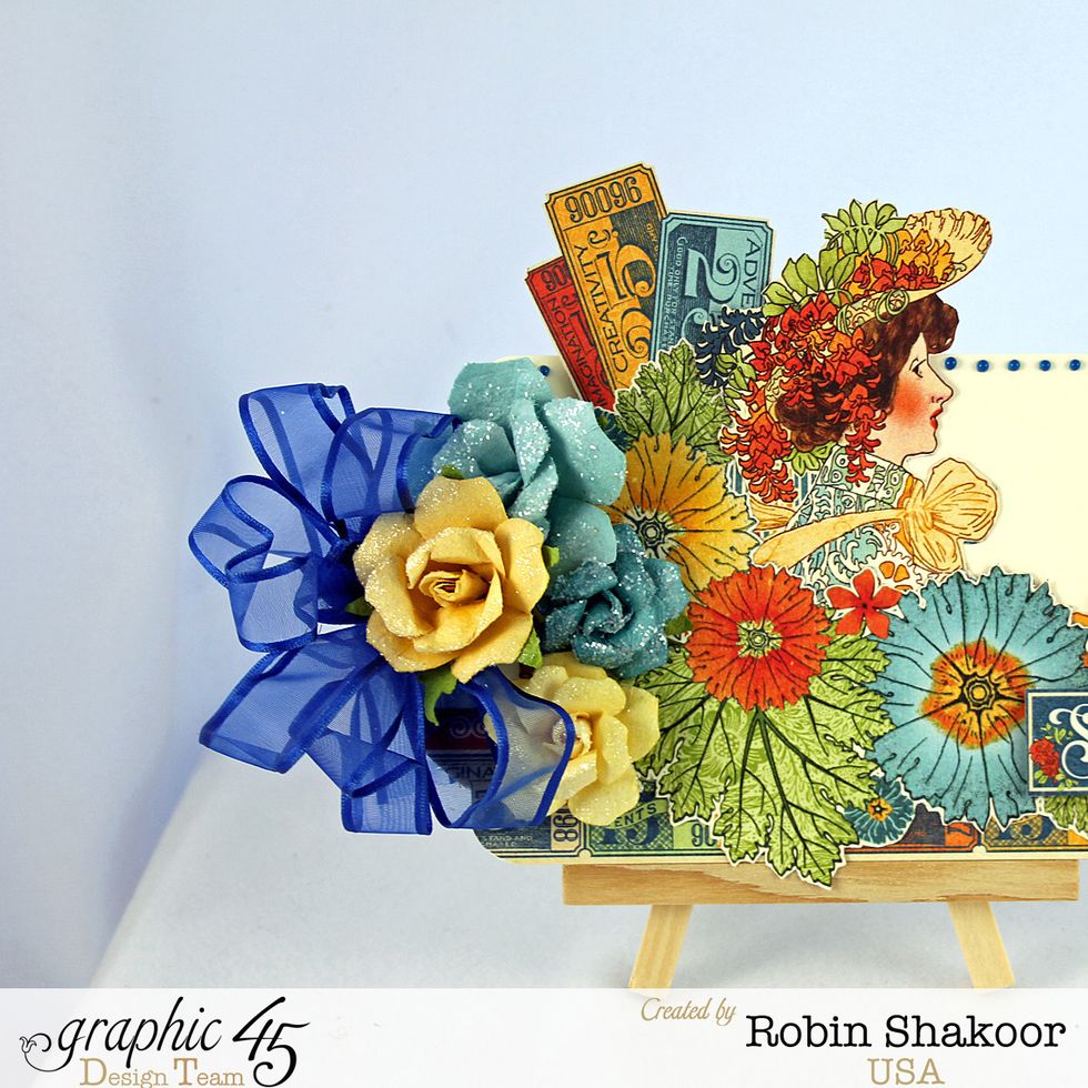 Add flowers and ribbon.