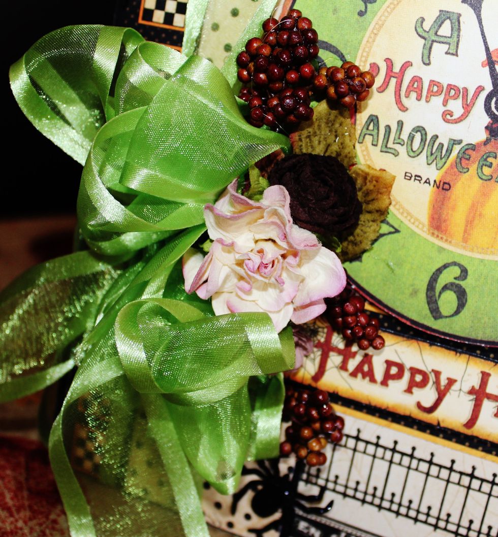 add flowers, berries and ribbon to top of prepared box.