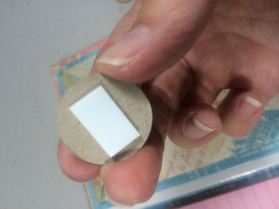 Add foam tape to the back of the button.