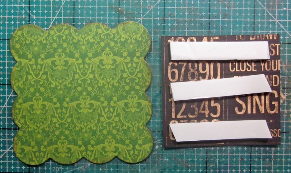 Add foam tape to the front of your mini book and then attach the top you just cut out from the die cut.