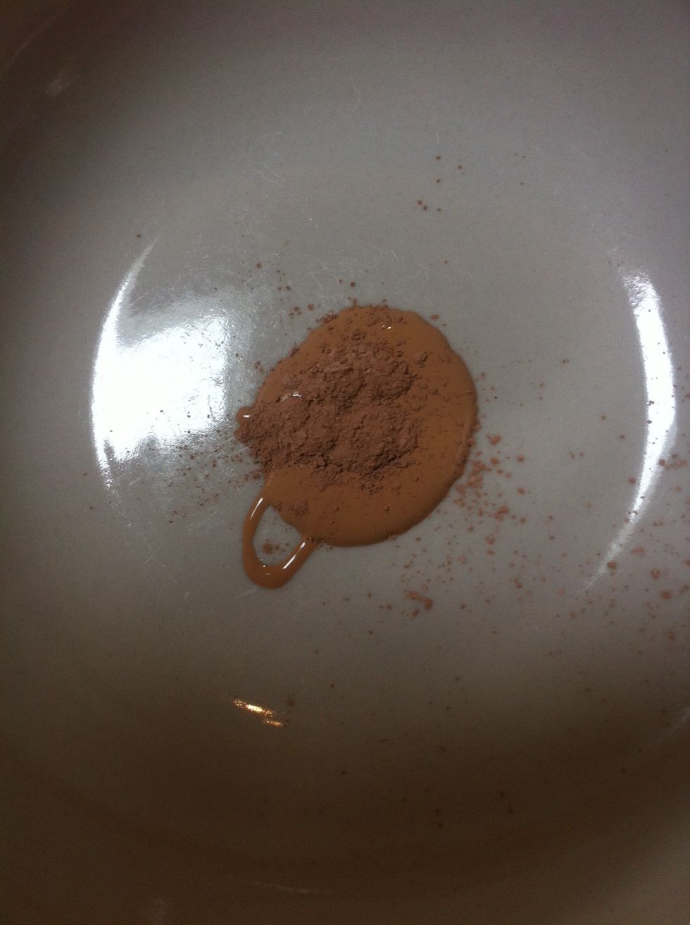 Add foundation and loose powder to a bowl