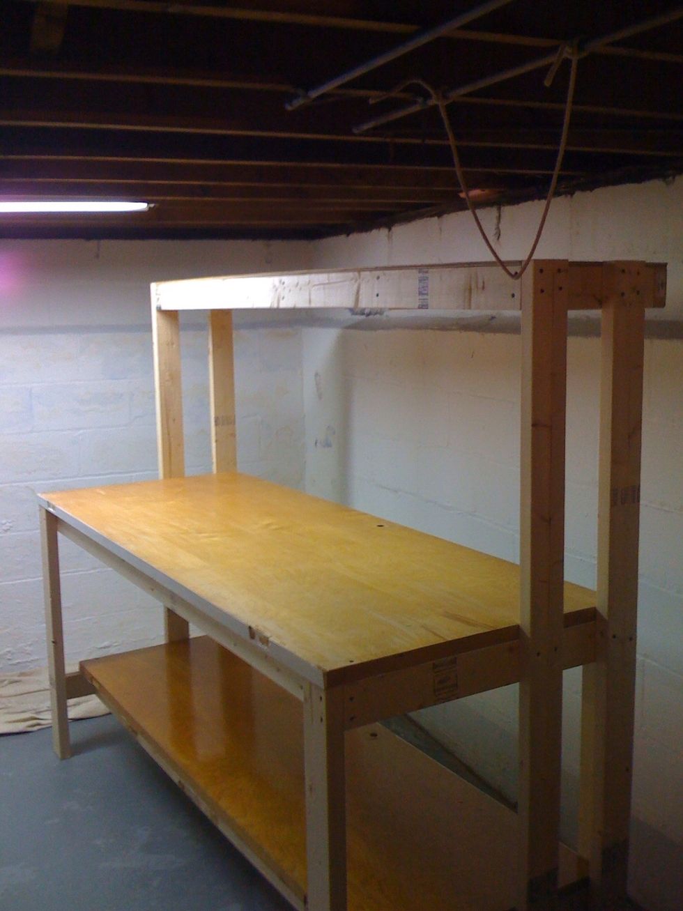 Add four 2x4's the height you want the shelf (mine is 67"), then attach frame to the 2x4's.