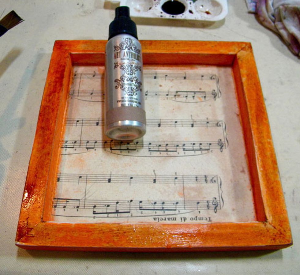 Add French Toast Colorations spray to the orange and the blue, wiping the excess away.