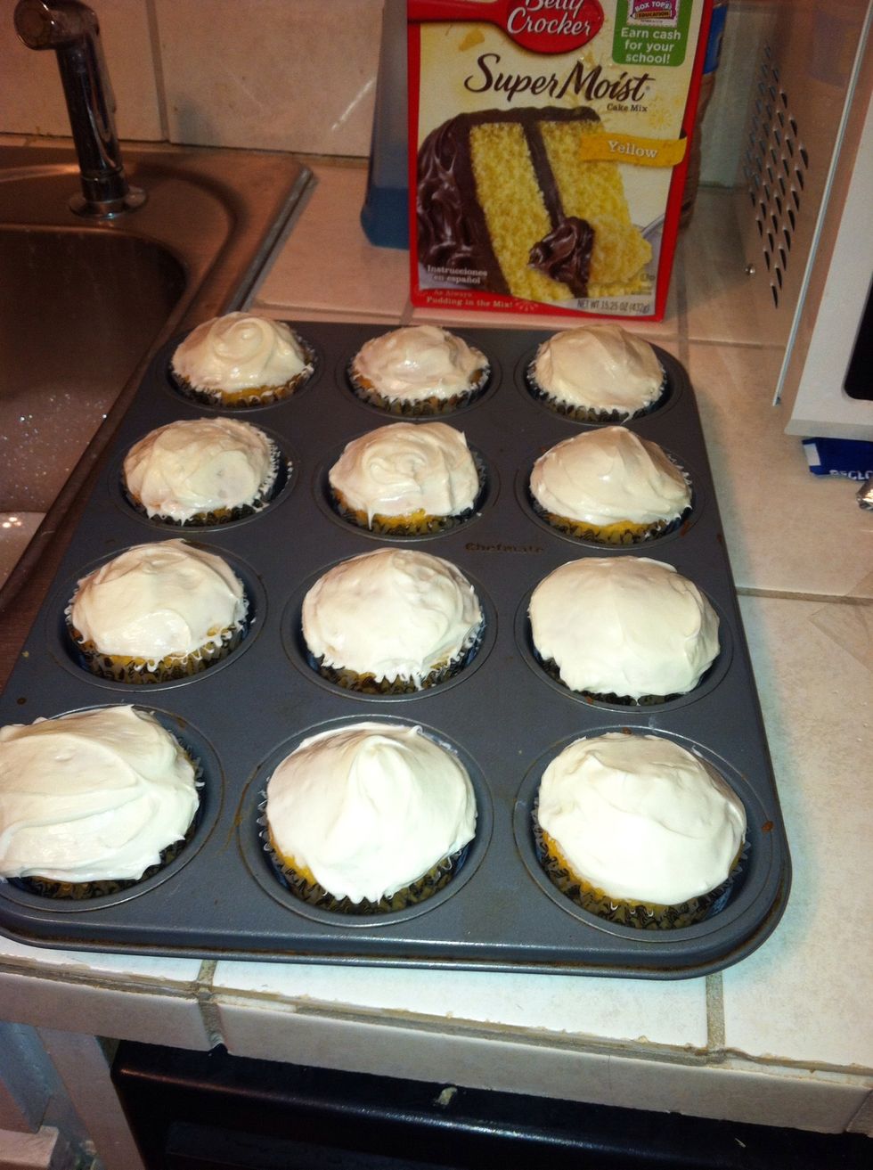 Add frosting to the cupcakes