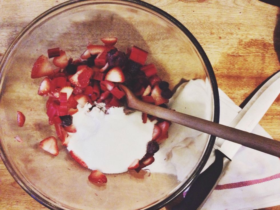 Add frozen berries, and sugar. Stir to combine.