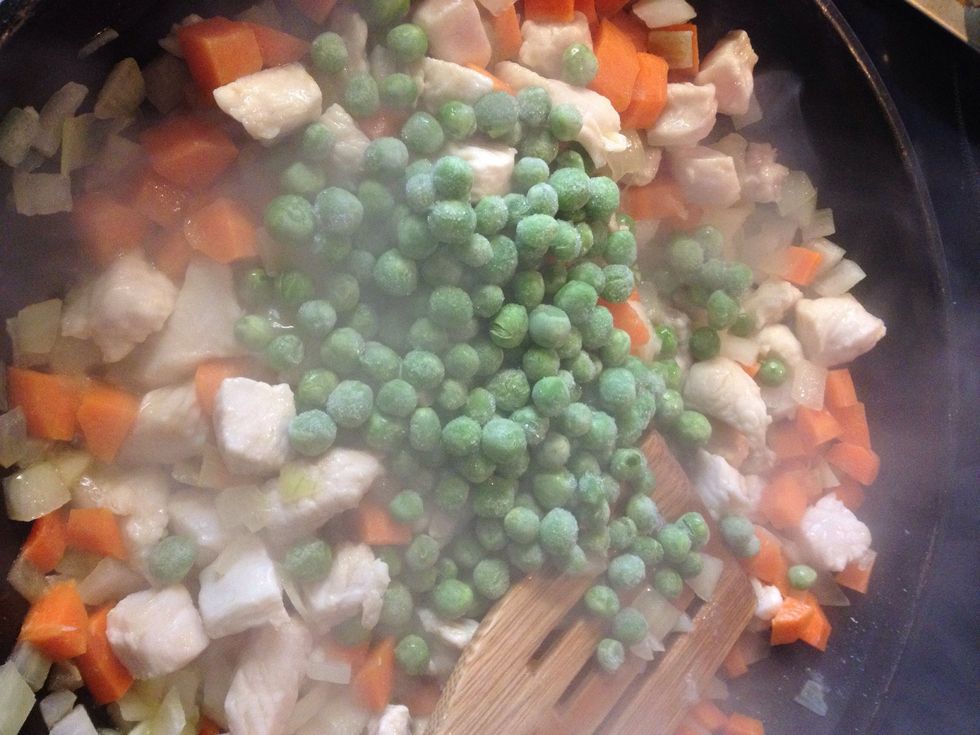 Add frozen peas when chicken is cooked.