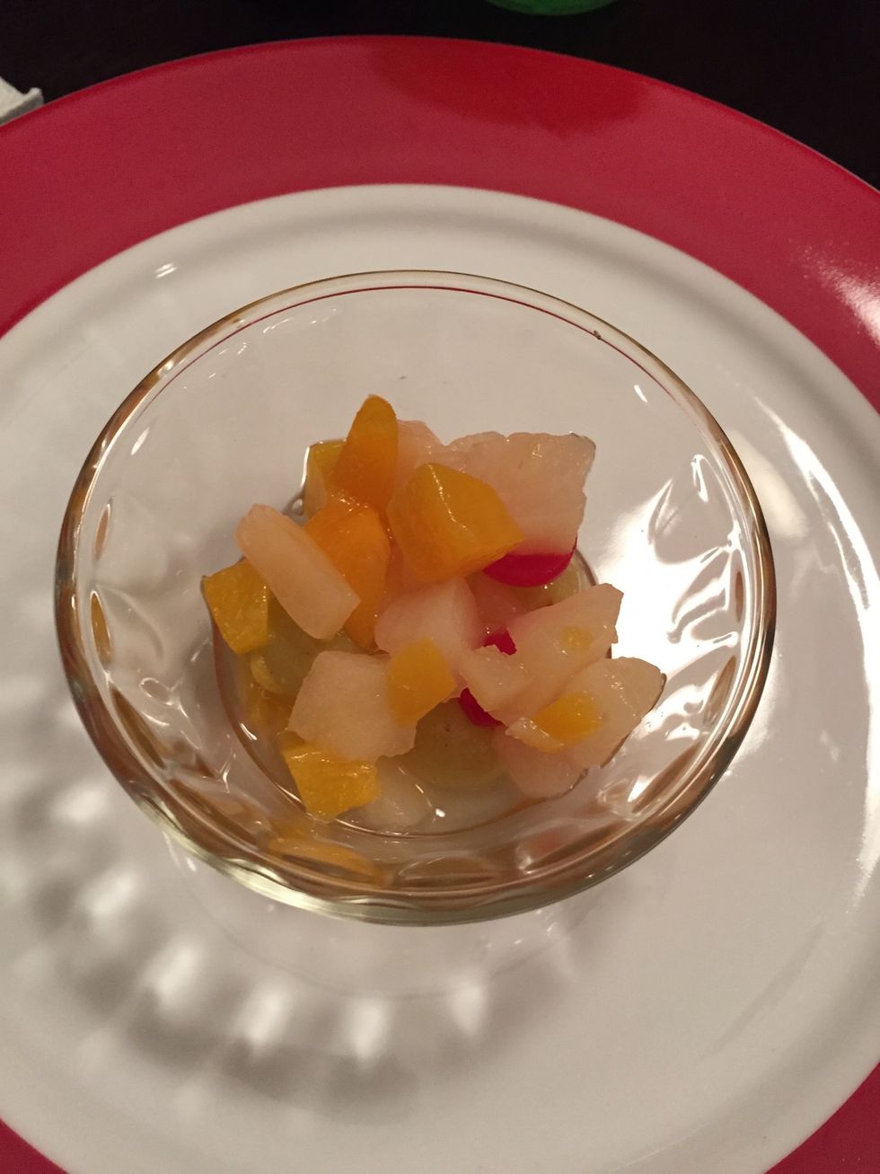 Add fruit cocktail to a bowl of choice