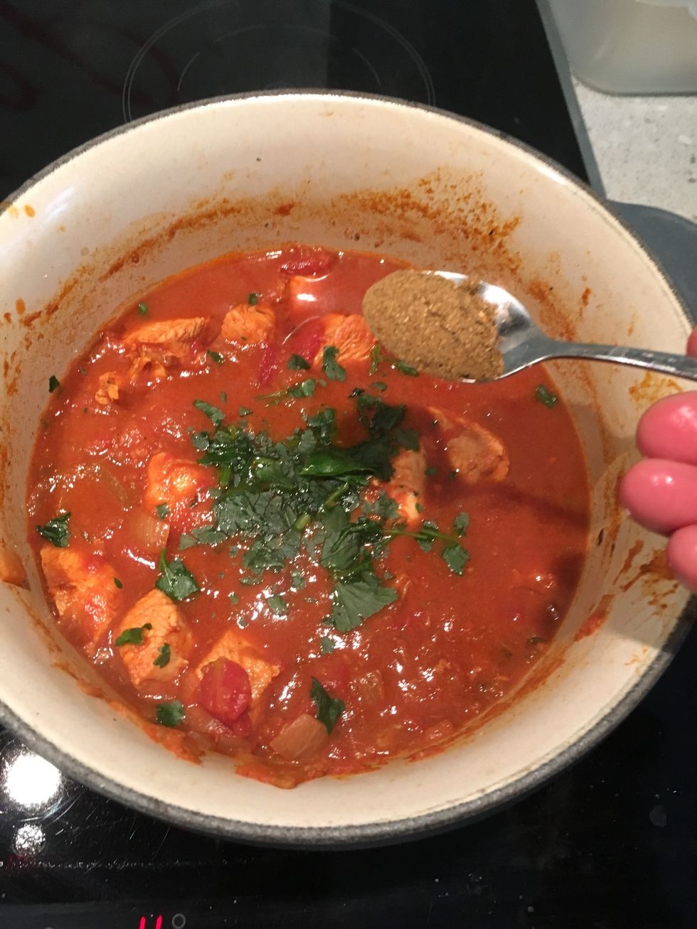 Add garam masala. Mix, cook on low for another 15 mins, check meat is cooked, and serve with bread of your choice.