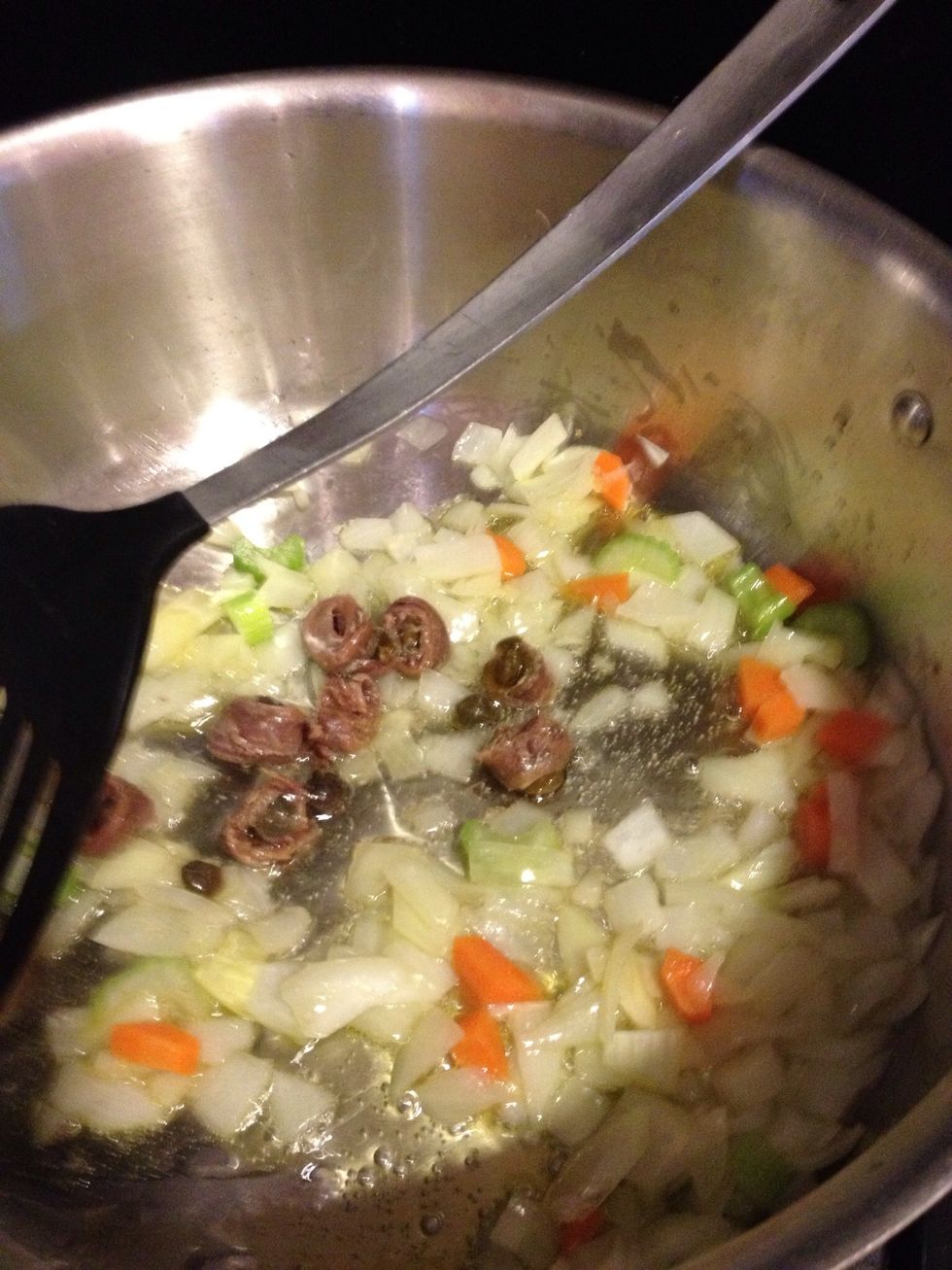 Add garlic & anchovies.