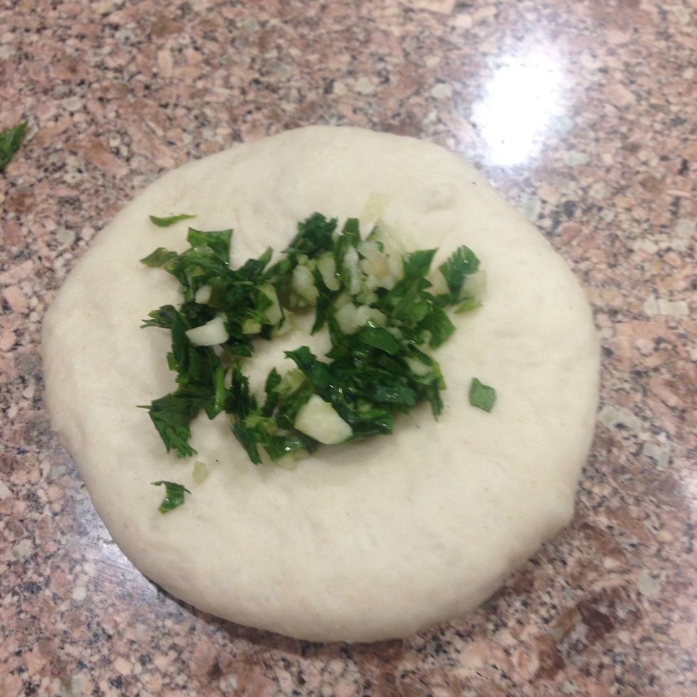 Add garlic and cilantro before rolling.