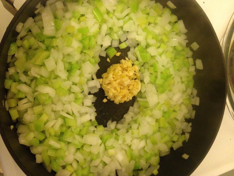 Add garlic and cook 1 minute.